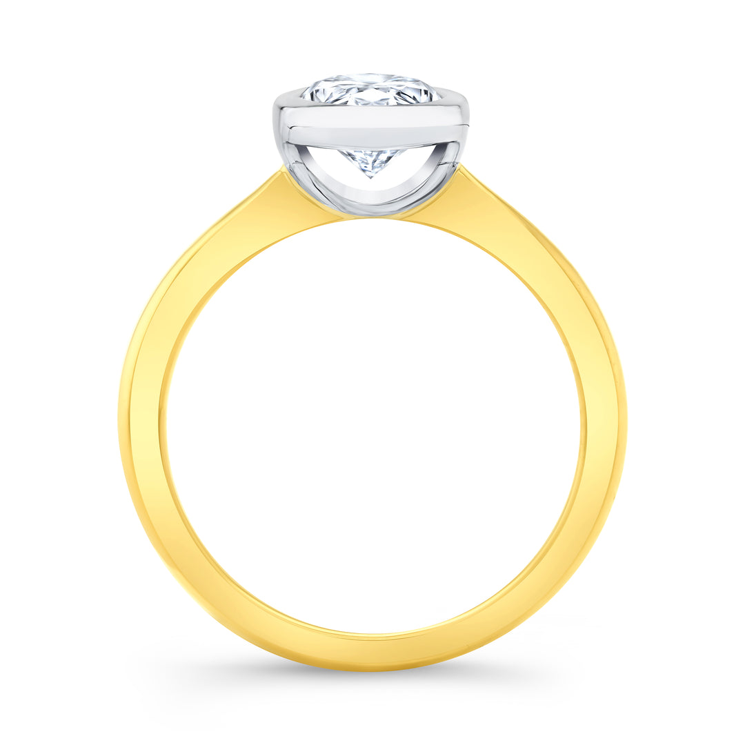 Oval Cut Bezel Set Diamond solitaire ring in white gold bezel with yellow gold band side profile