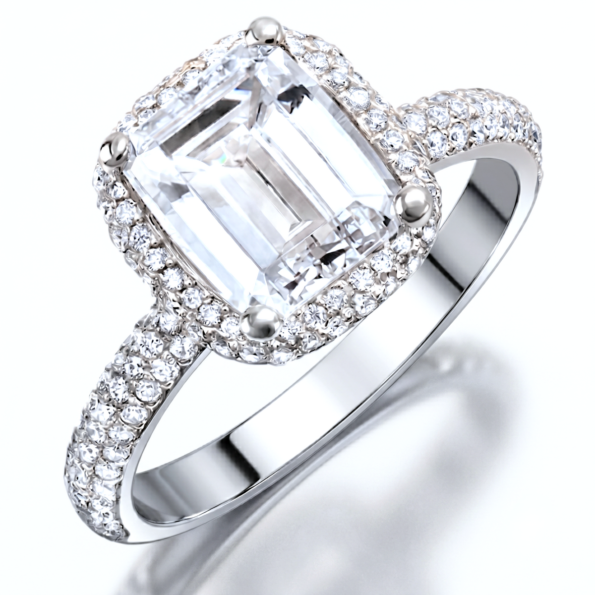 Rounded_halo_emerald_cut_pave_ring_platinum