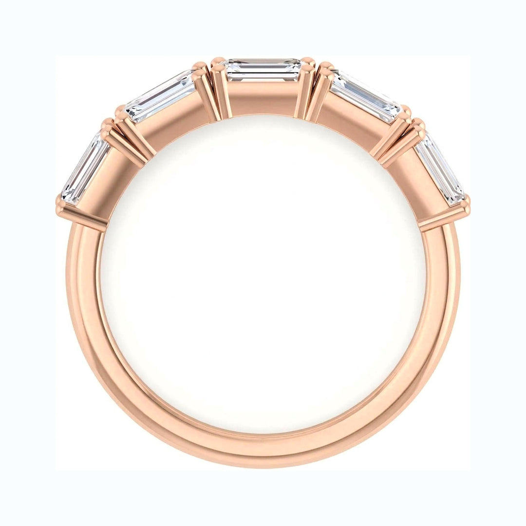 5 stone emerald cut east west diamond band rose gold,, shown on a clean white background. side view
