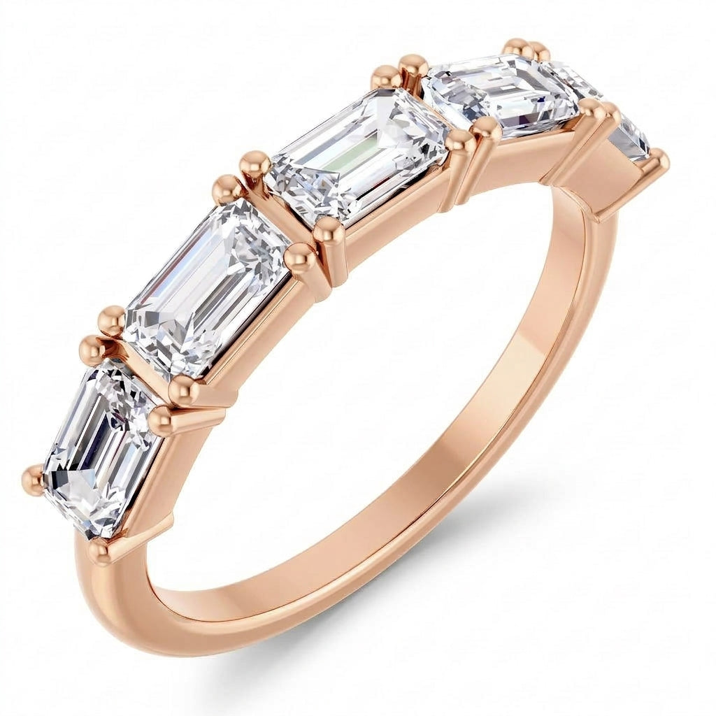 5 stone emerald cut east west diamond band rose gold,, shown on a clean white background.