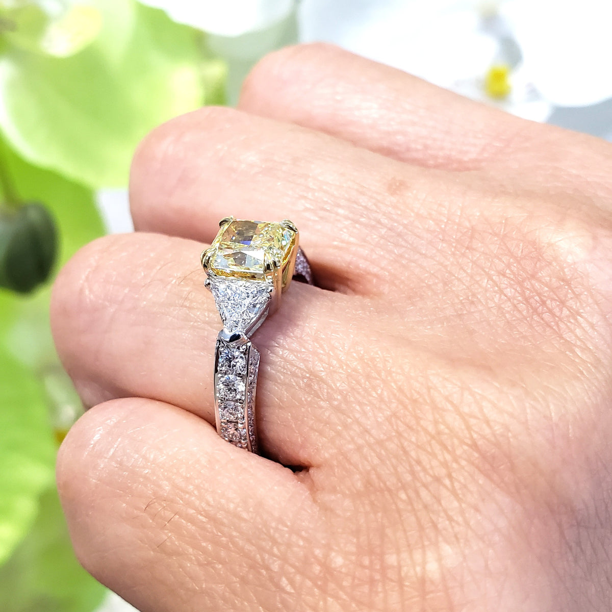 Square yellow radiant cut diamond ring & trillions diamond ring on hand side view