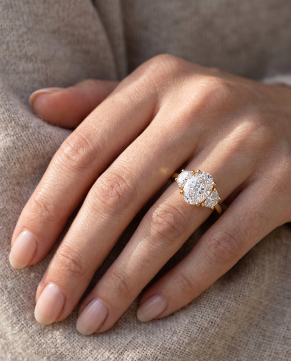 Trilogy Oval Cut with Half Moons Three-Stone Ring