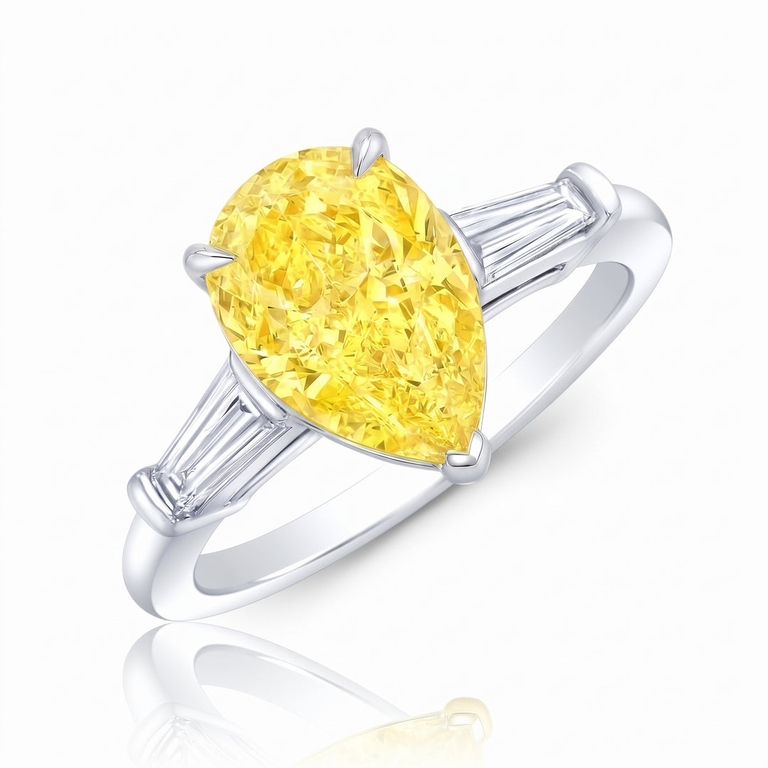 3-stone Pear Cut Yellow with Baguettes side diamond in white gold