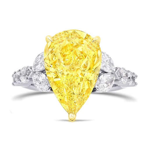 Yellow pear cut center with white marquise & round diamond ring in white gold