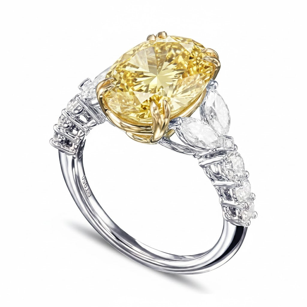 Yellow Oval cut with white marquise and round cut diamond ring in white gold side profile