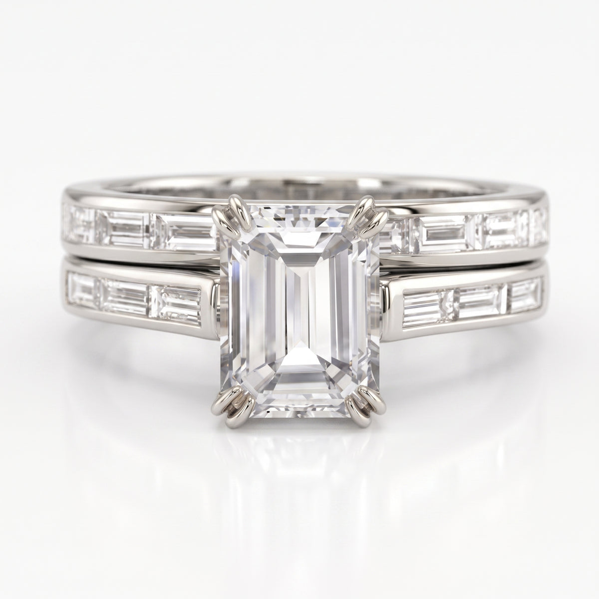 White_gold_emerald_and_baguettes_engagement_ring_set