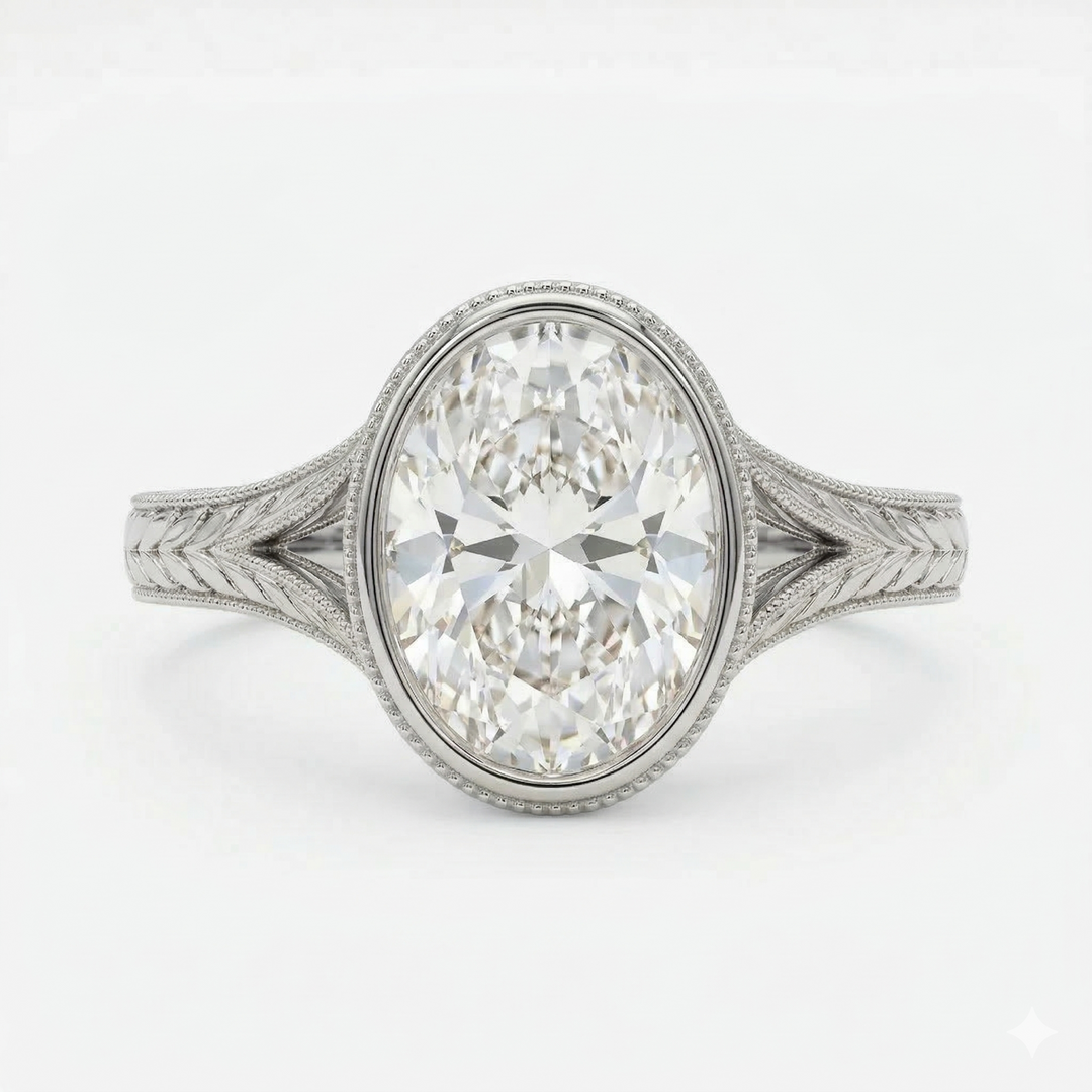 Oval bezel diamond with engraved split shank ring in white gold
