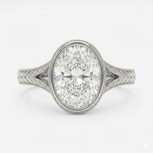 Oval bezel diamond with engraved split shank ring in white gold
