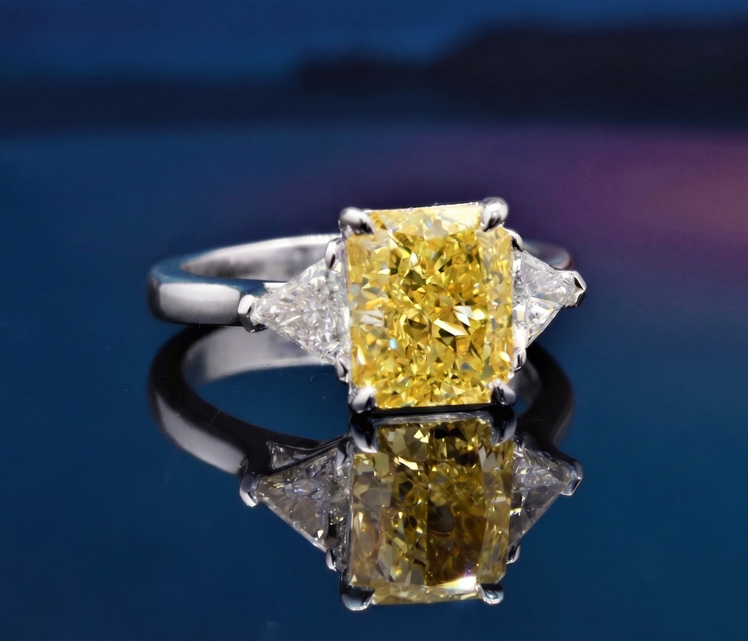 4.20 Ct. Elongated Radiant Fancy Light Yellow & Trillions 3 Stone Ring VS1 GIA Certified