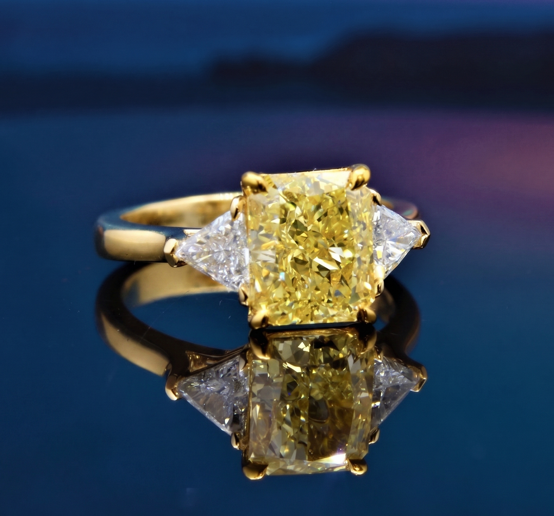 4.20 Ct. Elongated Radiant Fancy Light Yellow & Trillions 3 Stone Ring VS1 GIA Certified