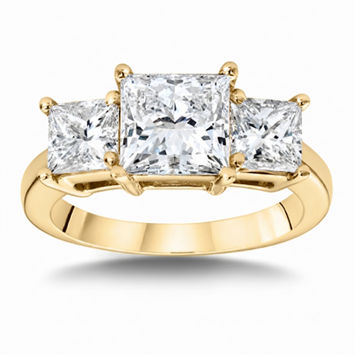 Yellow_gold_3_stone_princess_cut