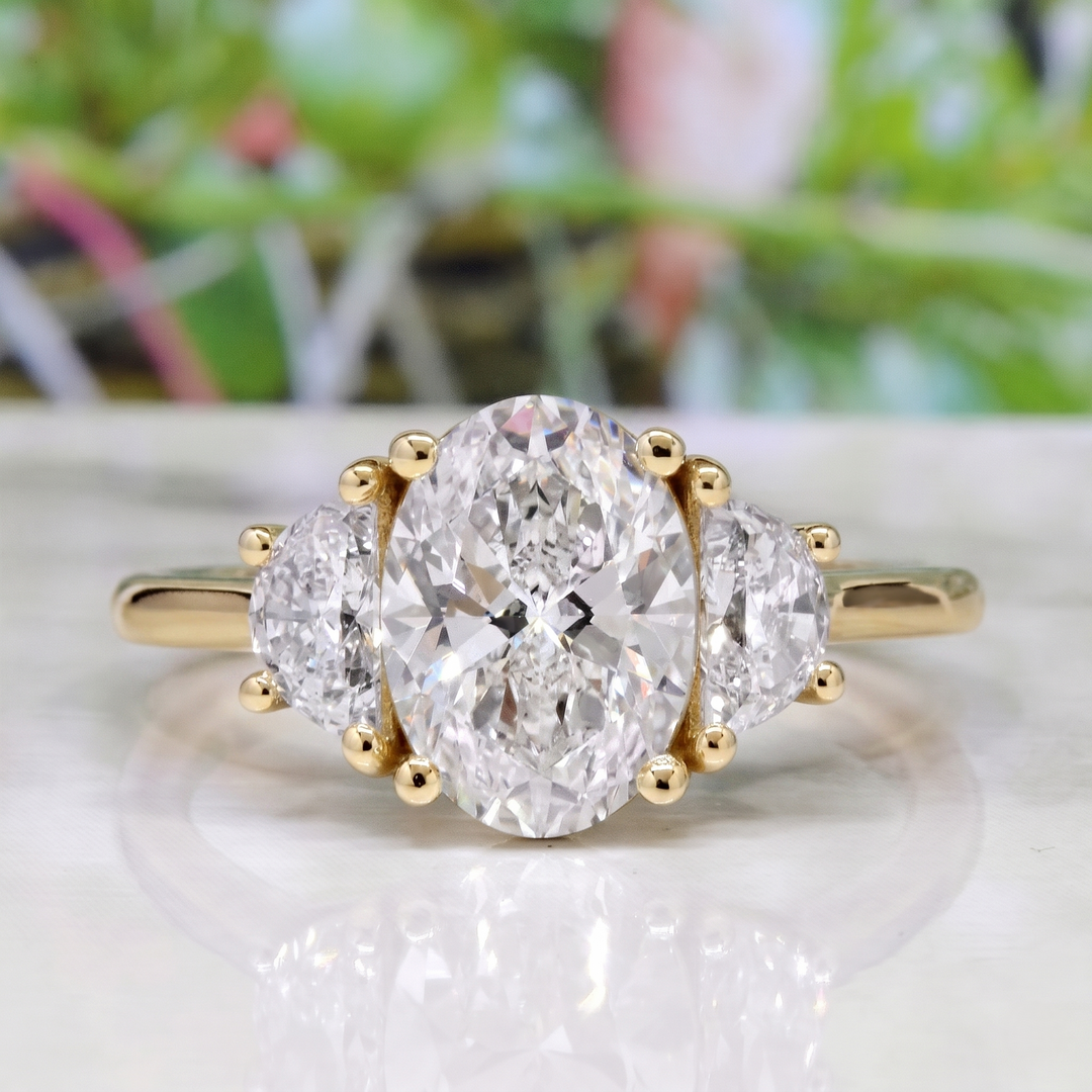Lab Grown Oval Cut 3-Stone Diamond Ring with Half Moons D VVS1 IGI Certified