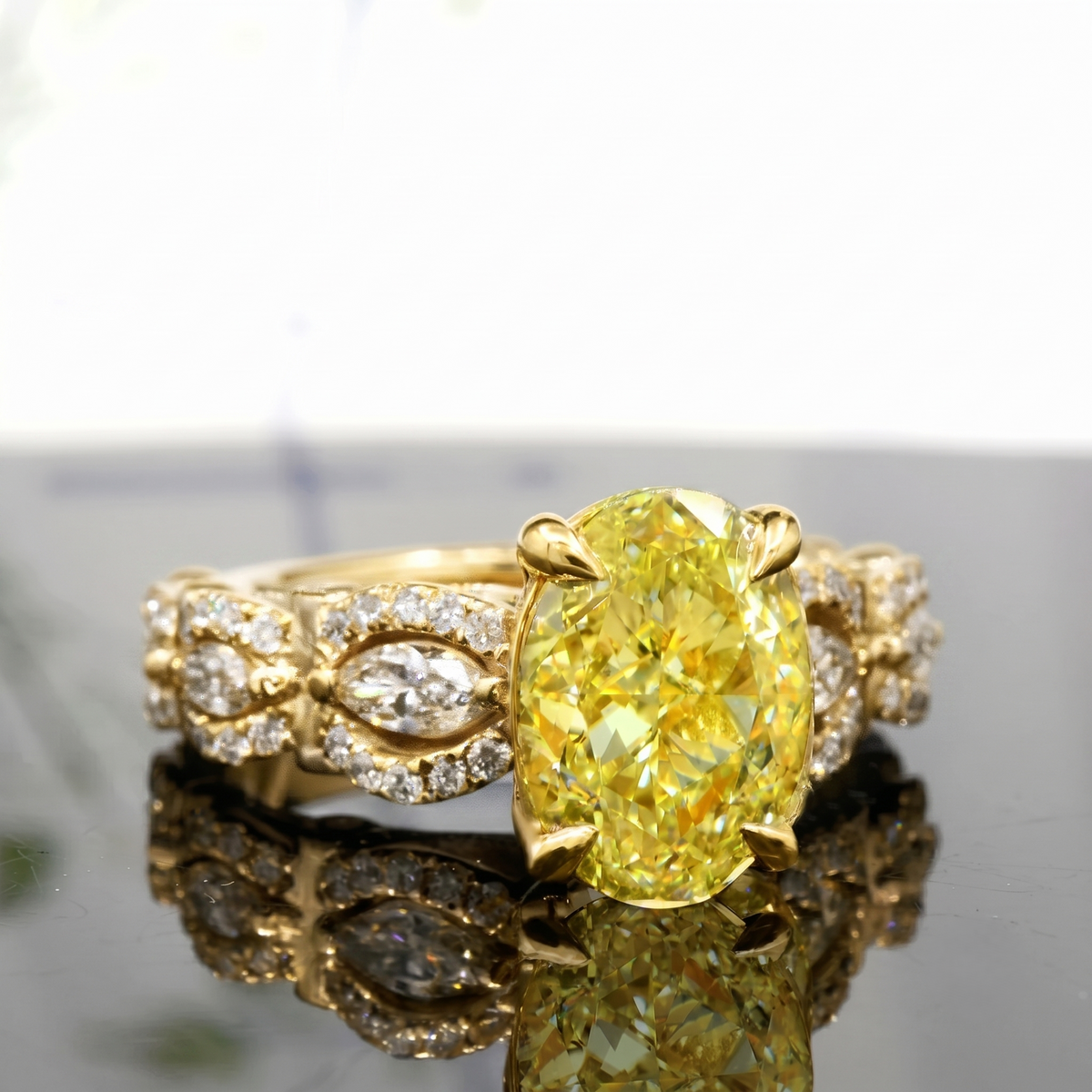 Yellow_oval_with_beasutiful_marquise_and_round_setting_yellow_gold