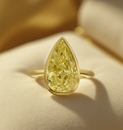 3.20 Ct Canary Fancy Light Yellow Pear Cut Solitaire Diamond Ring VVS1 GIA