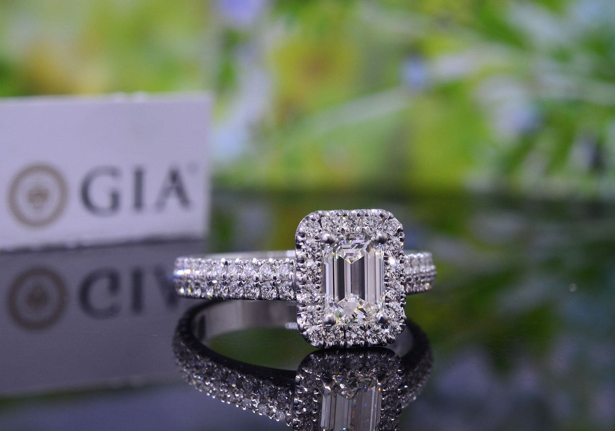 Emerald cut halo engagement ring