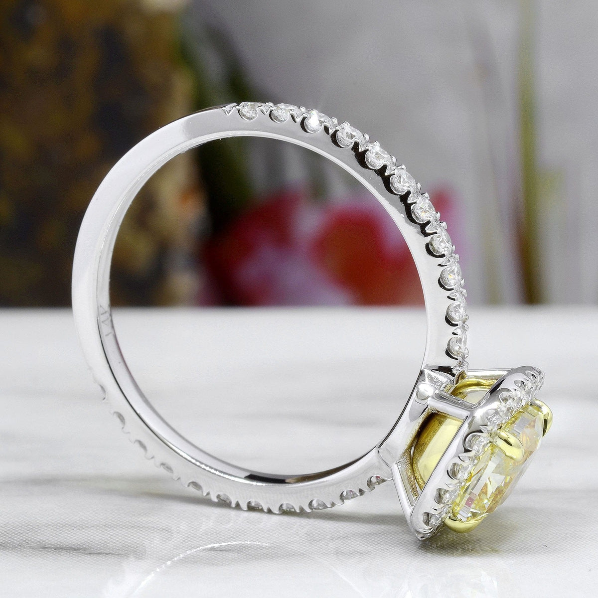 Halo canary diamond engagement ring profile view
