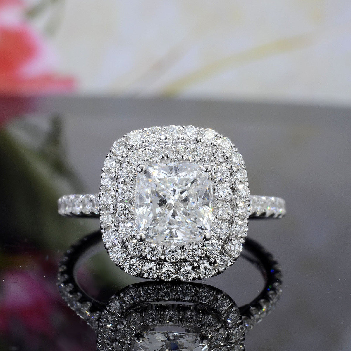 Double halo cushion cut engagement ring