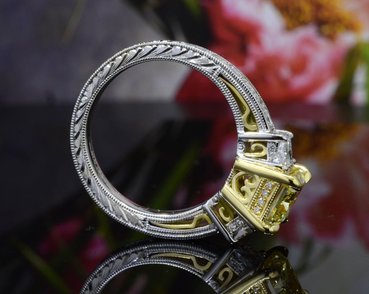 Side view of elongated canary fancy intense yellow radiant cut diamond ring