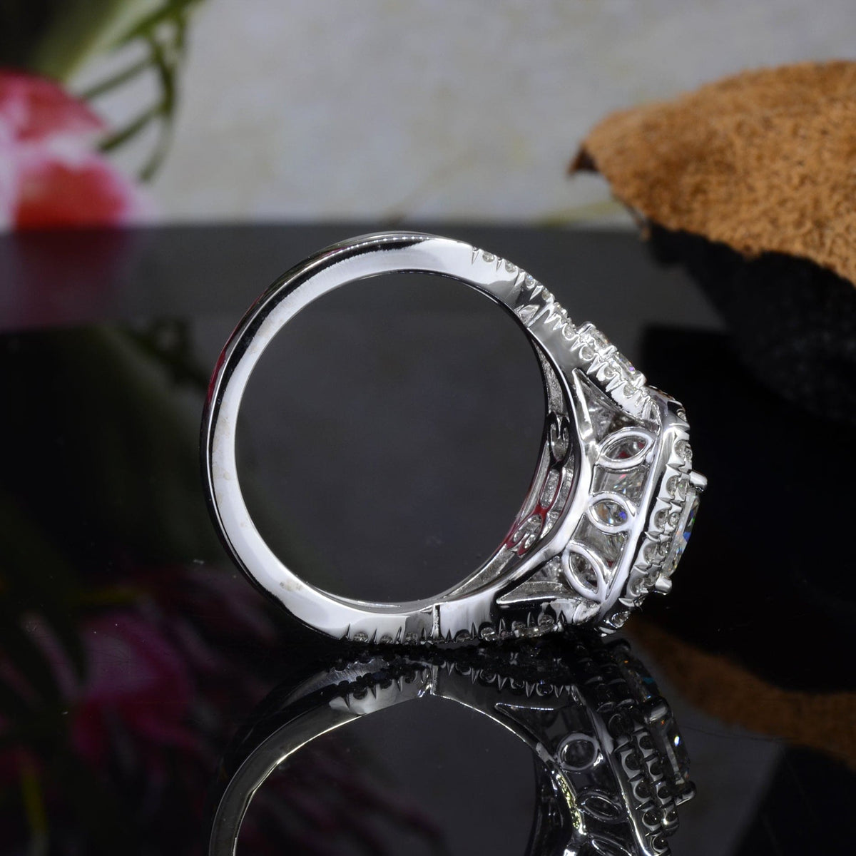 Double halo twist shank engagement ring side profile
