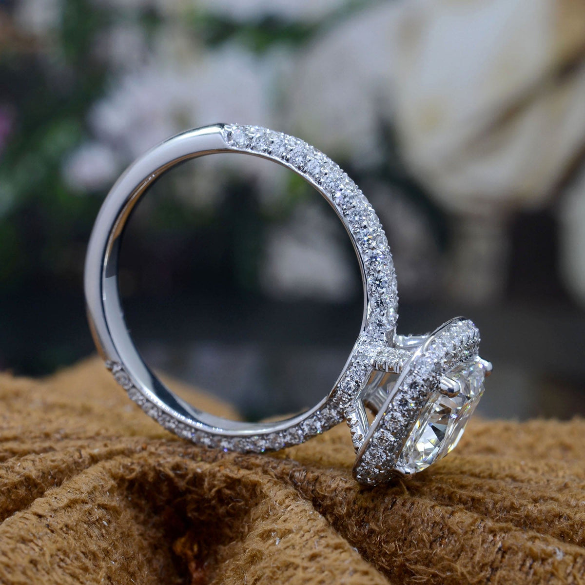 Halo + hidden halo cushion diamond ring side profile