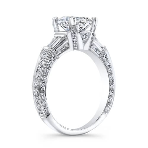Round cut engagement ring with baguettes profile view
