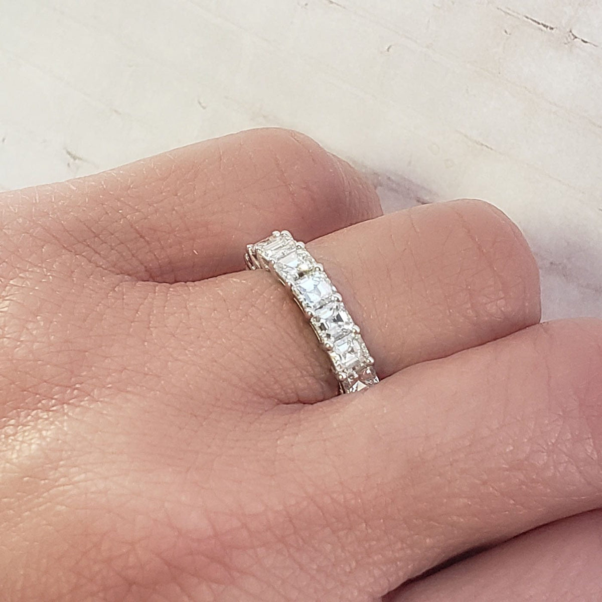 Asscher cut eternity band  white gold   view on finger