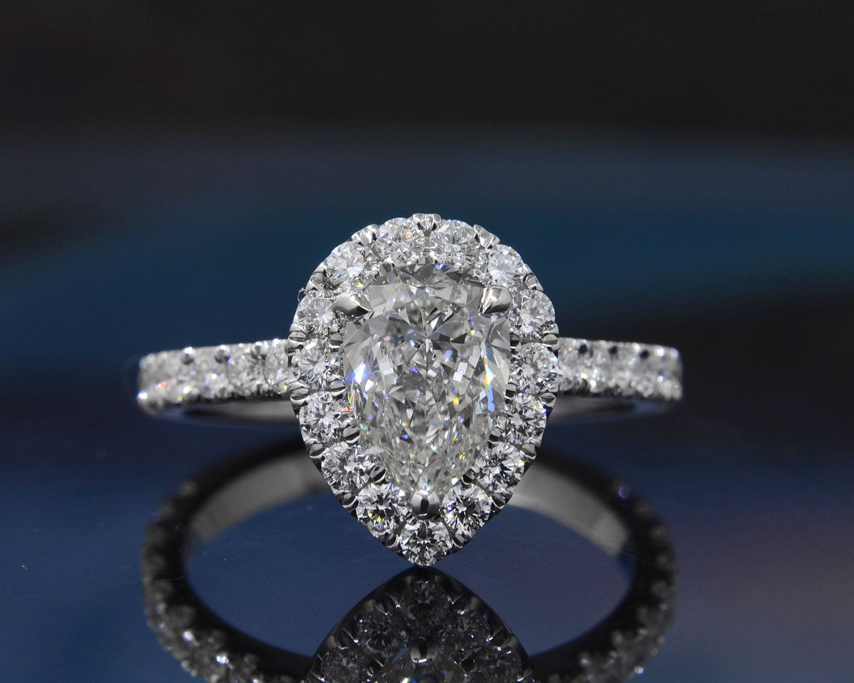 Teardrop pear halo engagement ring set