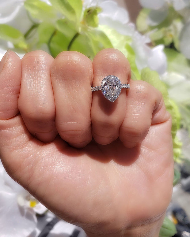 Teardrop Pear Halo Engagement Ring Set on Hand