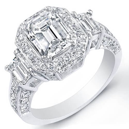 Emerald halo 3 stone engagement ring