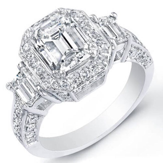 Emerald cut 3 stone halo engagement ring