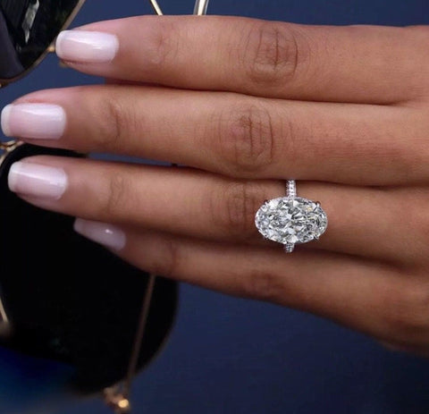 Hidden Halo Oval Engagement Ring on Hand