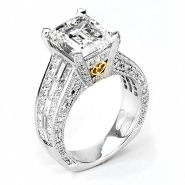 Wide shank emerald cut engagement ring
