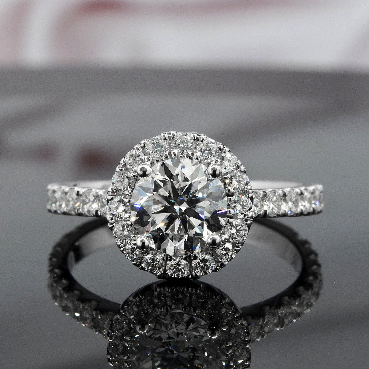 Round halo engagement ring front view