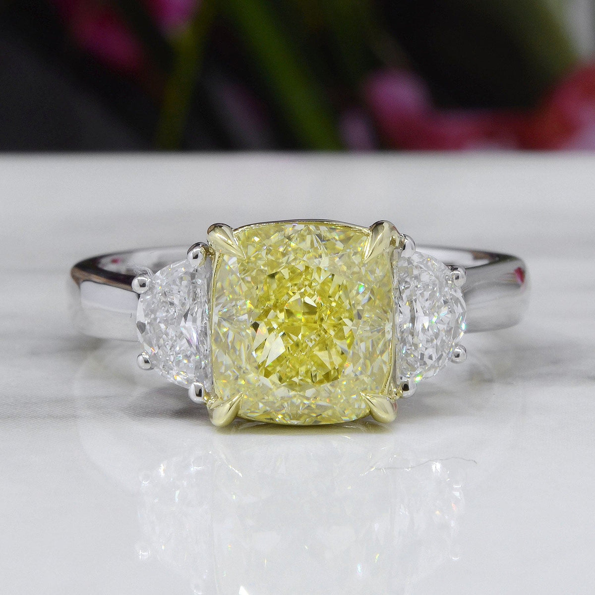 Fancy yellow cushion & half moon 3 stone diamond ring