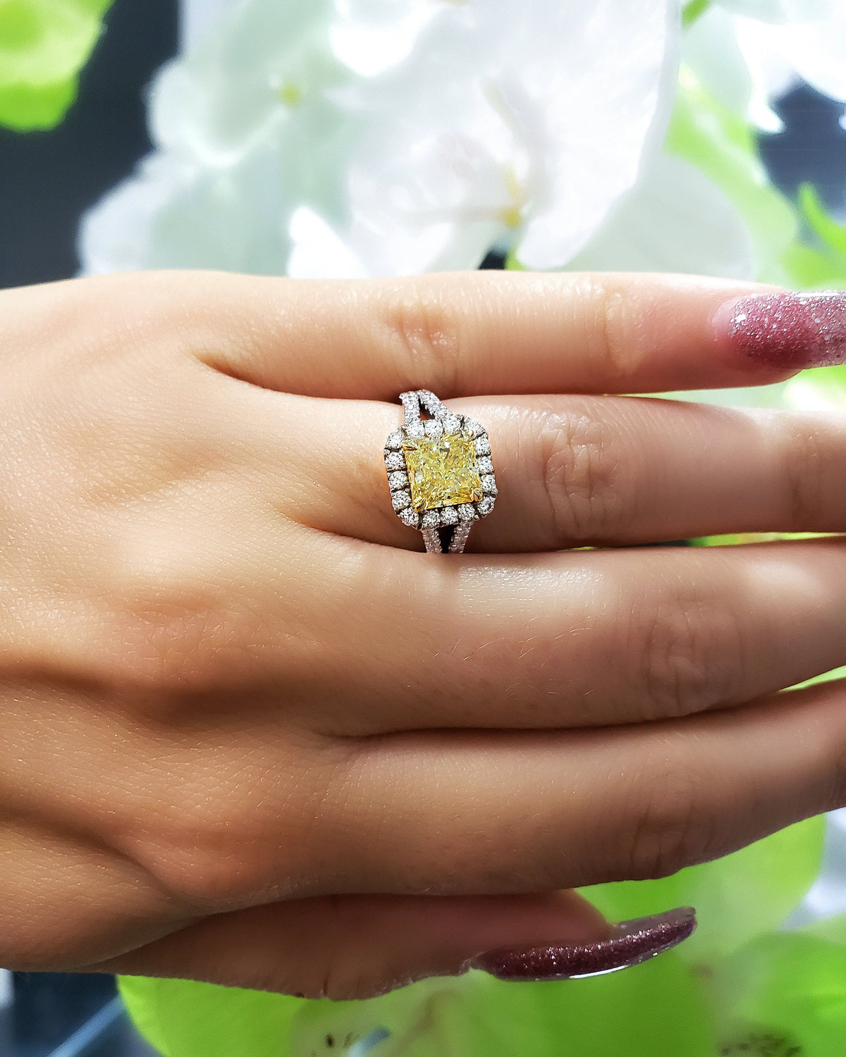 Fancy intense yellow halo radiant cut diamond ring