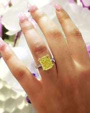 Hidden Halo Radiant Cut Fancy Yellow Engagement Ring on Hand