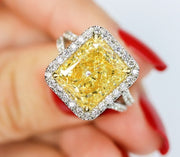 Elongated Canary Fancy Yellow Radiant Split Shank Halo Ring on Hand