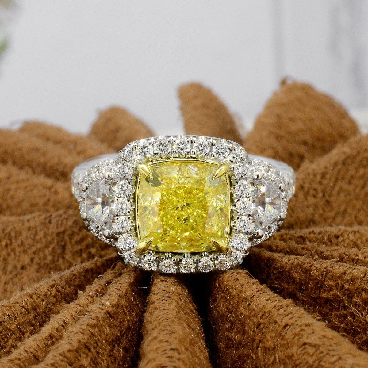 Yellow cushion & half moon halo engagement ring
