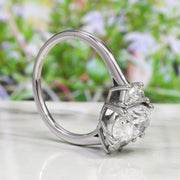 Oval Cut 3 Stone Diamond Ring with Half Moons Side Profile