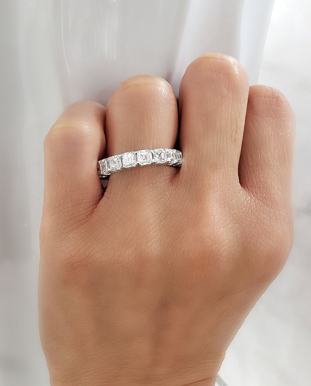 asscher cut eternity band - view on finger