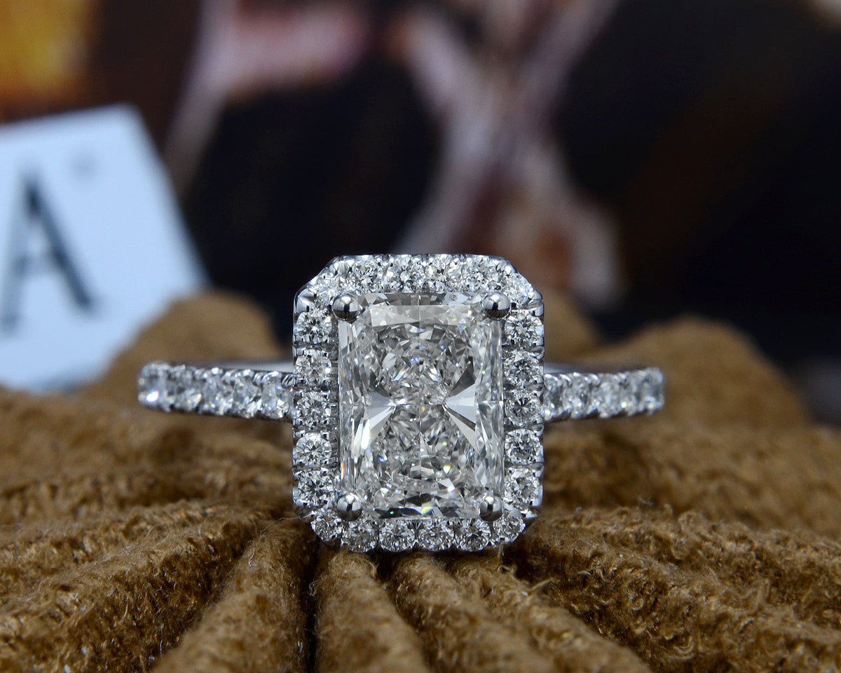 Radiant halo engagement ring