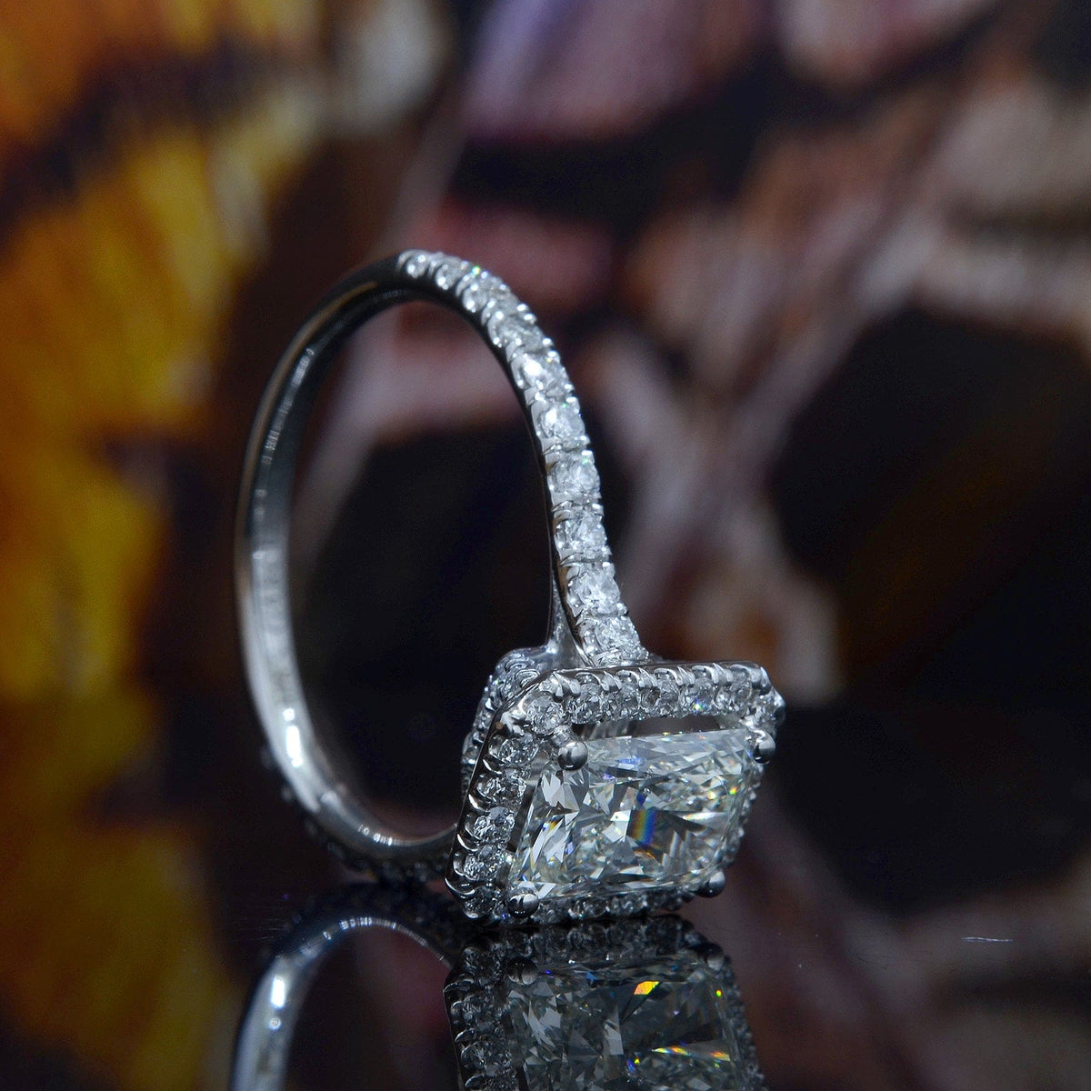 Radiant halo engagement ring side view