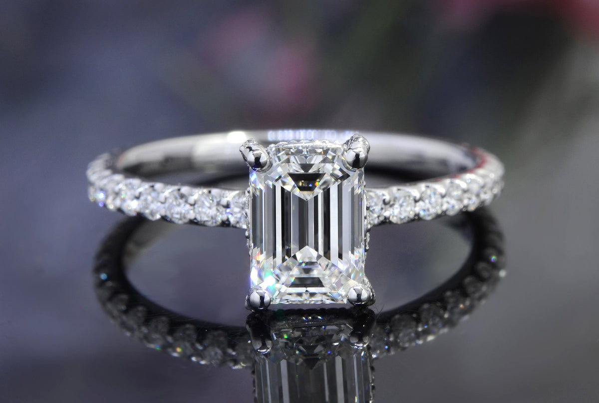 Hidden halo emerald cut engagement ring front view