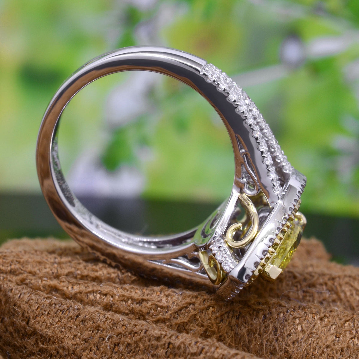 Pear shape canary fancy yellow halo engagement ring side view