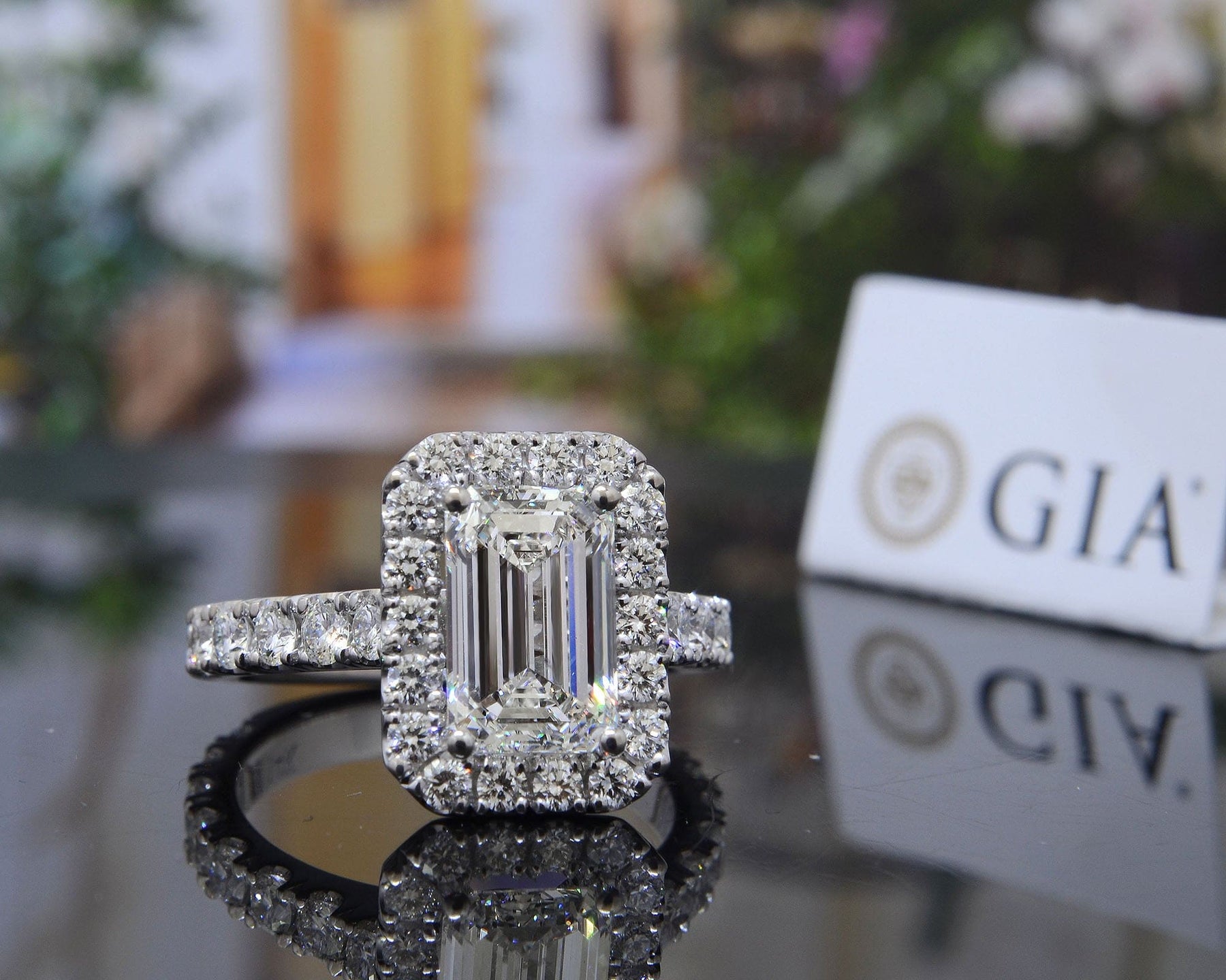 Emerald cut diamond ring halo deals