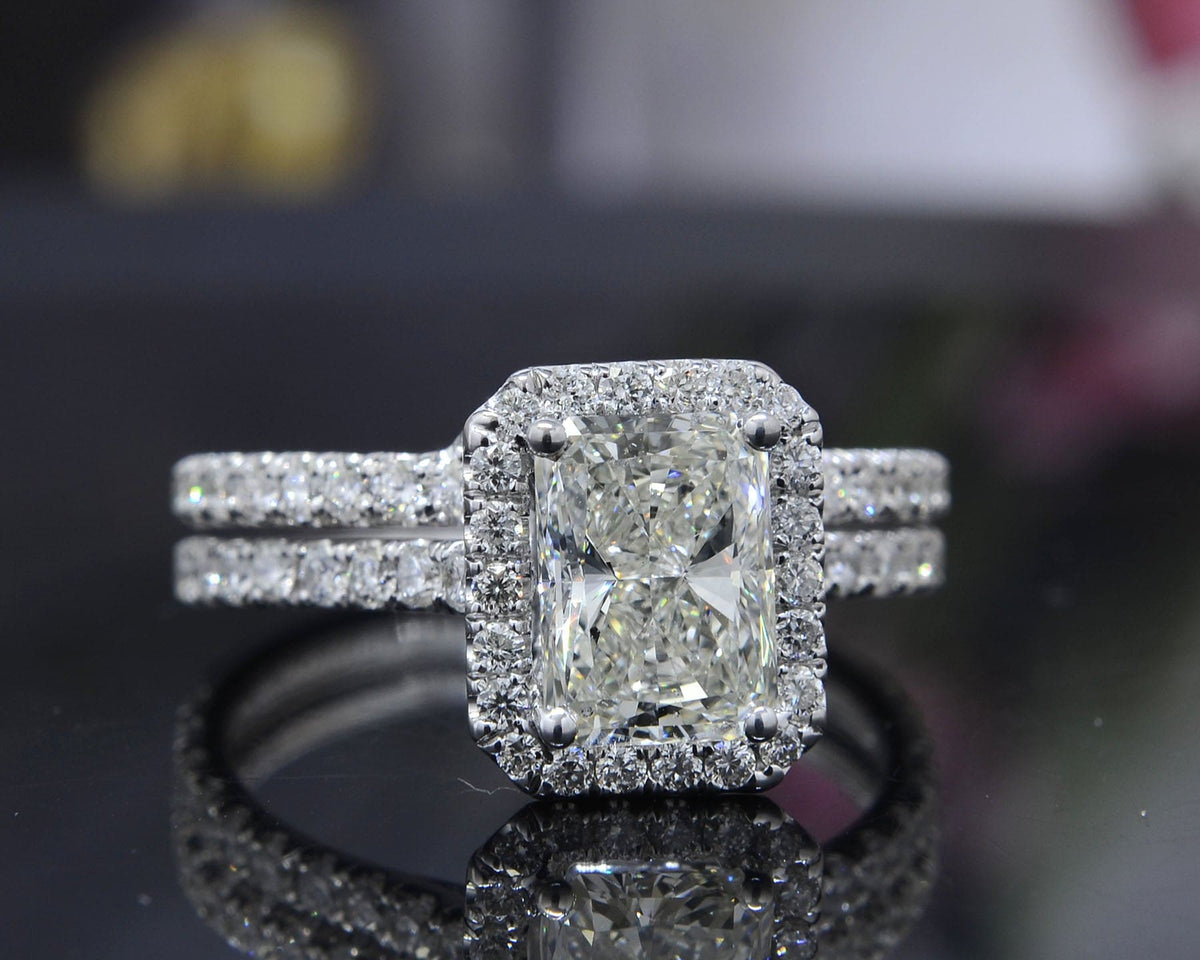 Radiant cut halo engagement ring & matching band