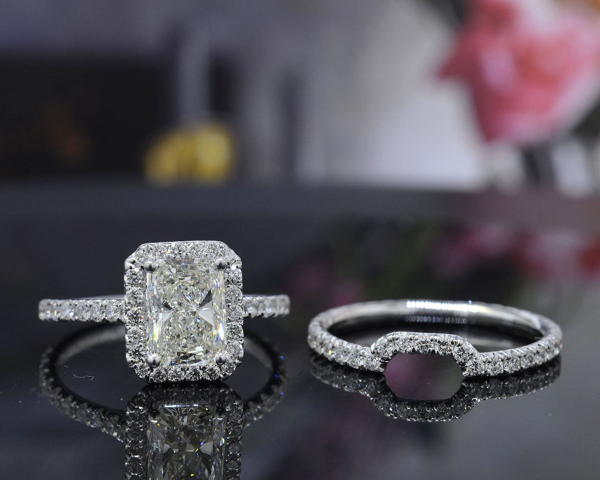 Radiant cut halo engagement ring & matching band