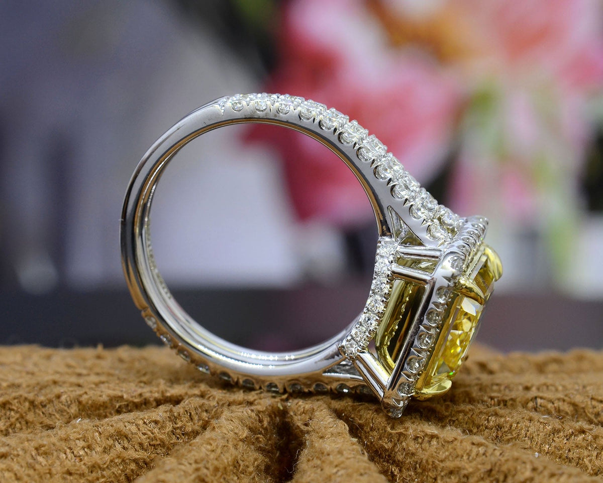 Elongated canary fancy yellow radiant split shank halo ring side profile