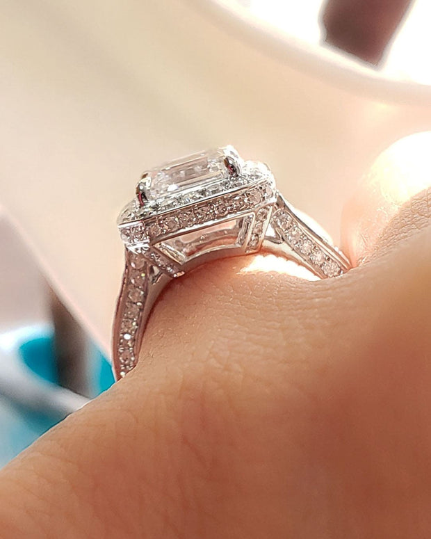 Halo Cushion Cut Engagement Ring Set on Hand