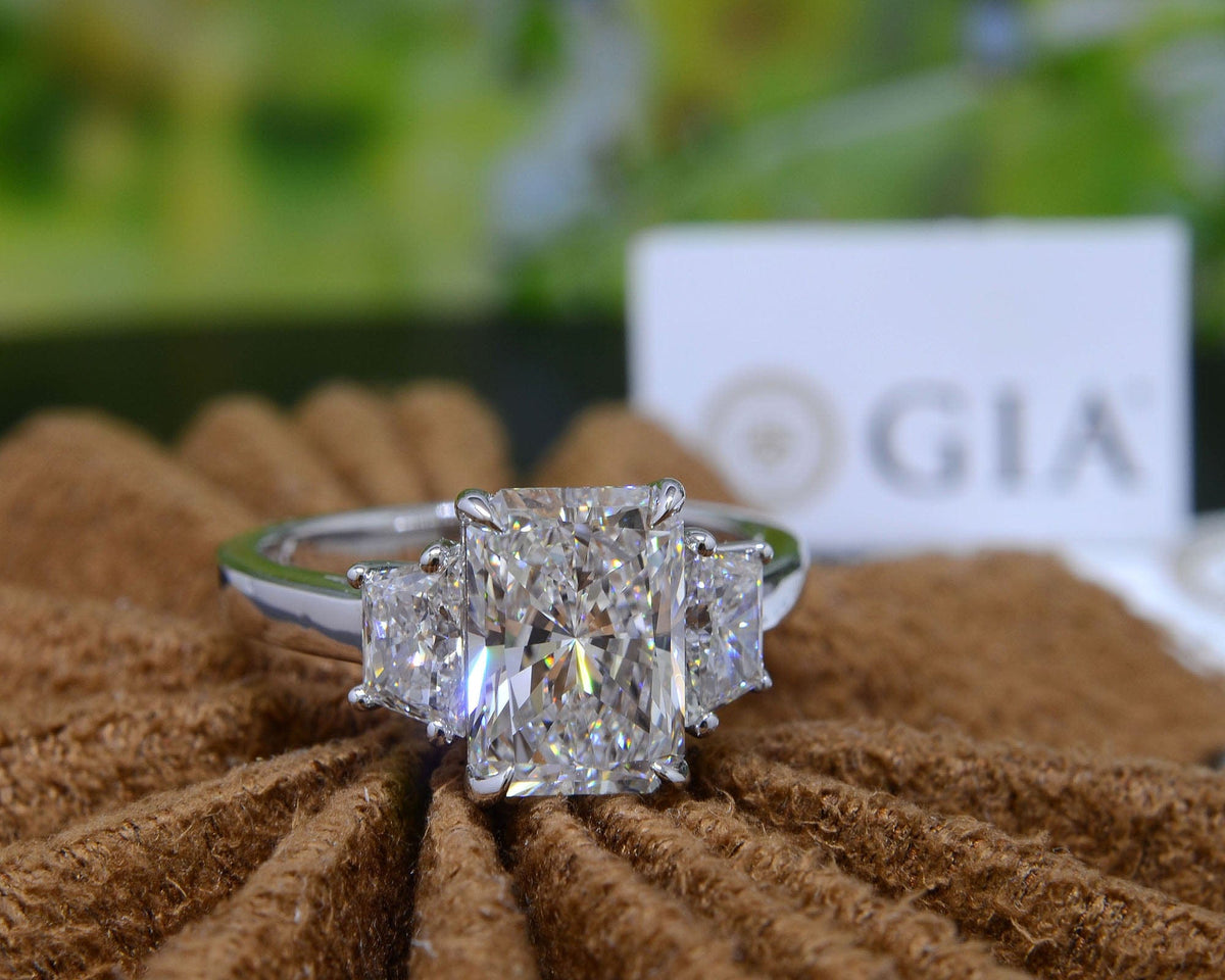 Elongated radiant cut & trapezoid 3 stone ring